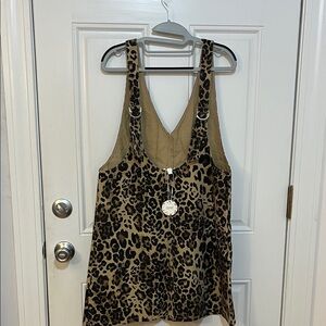 Leopard Print Sleeveless dress
 37 inch long with adjustable straps at min
